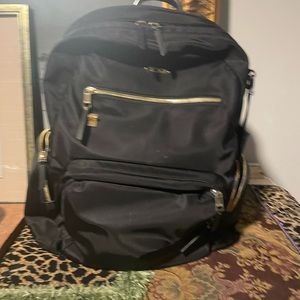 Tumi Carson Backpack with gold zippers perfect inside